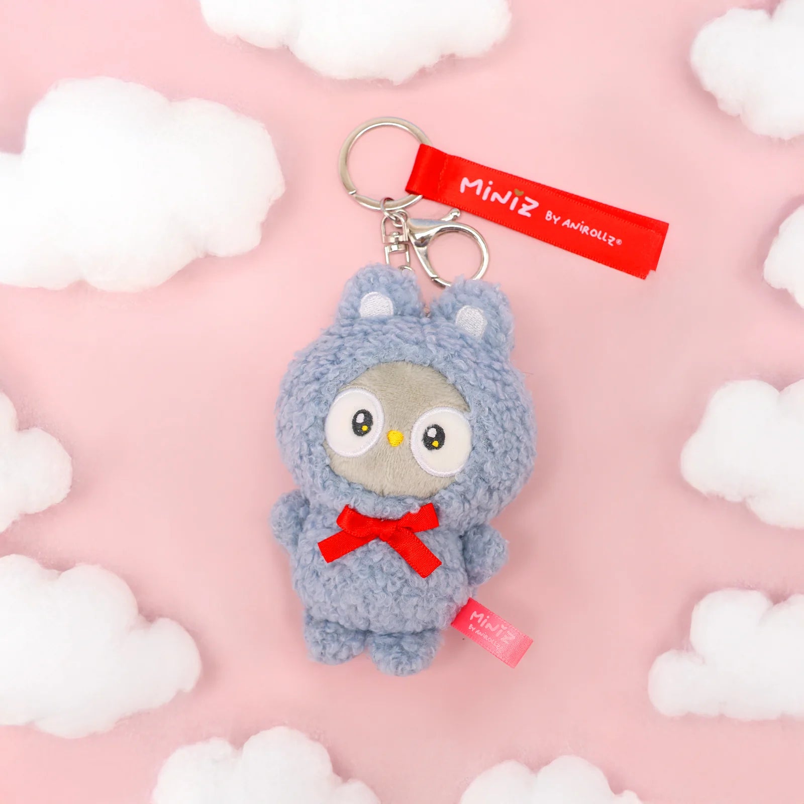 Front view Bunny Costume Owlyroll Plush Charm with Clouds Background